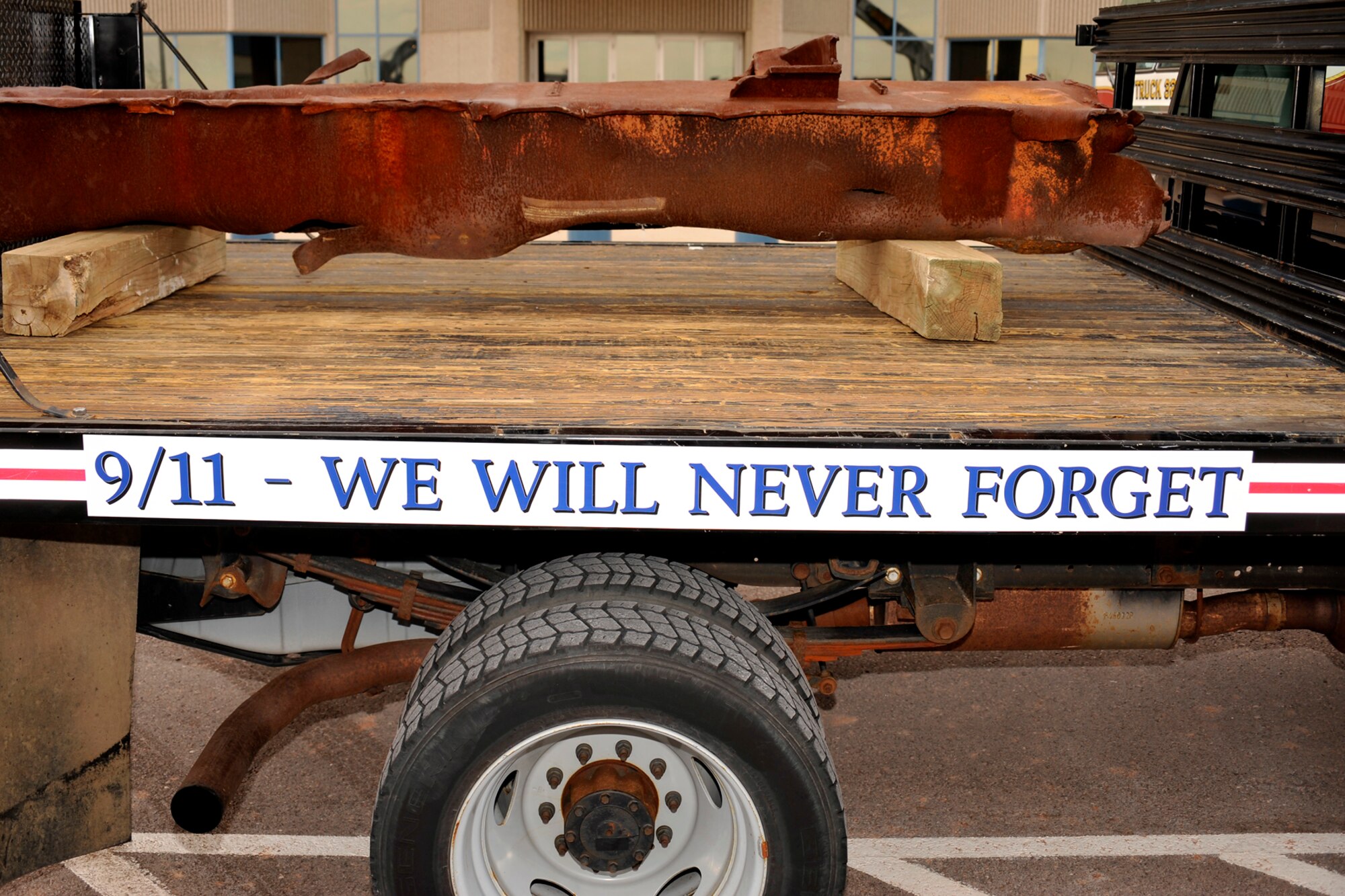 A steel beam recovered from the World Trade Center attack site in New York City arrived at Cheyenne Mountain Air Force Station Nov. 19. The beam will be incorporated into a permanent memorial on CMAFS and is expected to be officially unveiled next September. Col. Rusty Wilson, 721st Mission Support Group commander at Cheyenne Mountain, invited a team of engineering students from the University of Colorado at Colorado Springs to design the memorial, which will be placed in front of the 721 MSG headquarters building to commemorate the people who died Sept. 11, 2001. (U.S. Air Force photo/Larry Hulst)