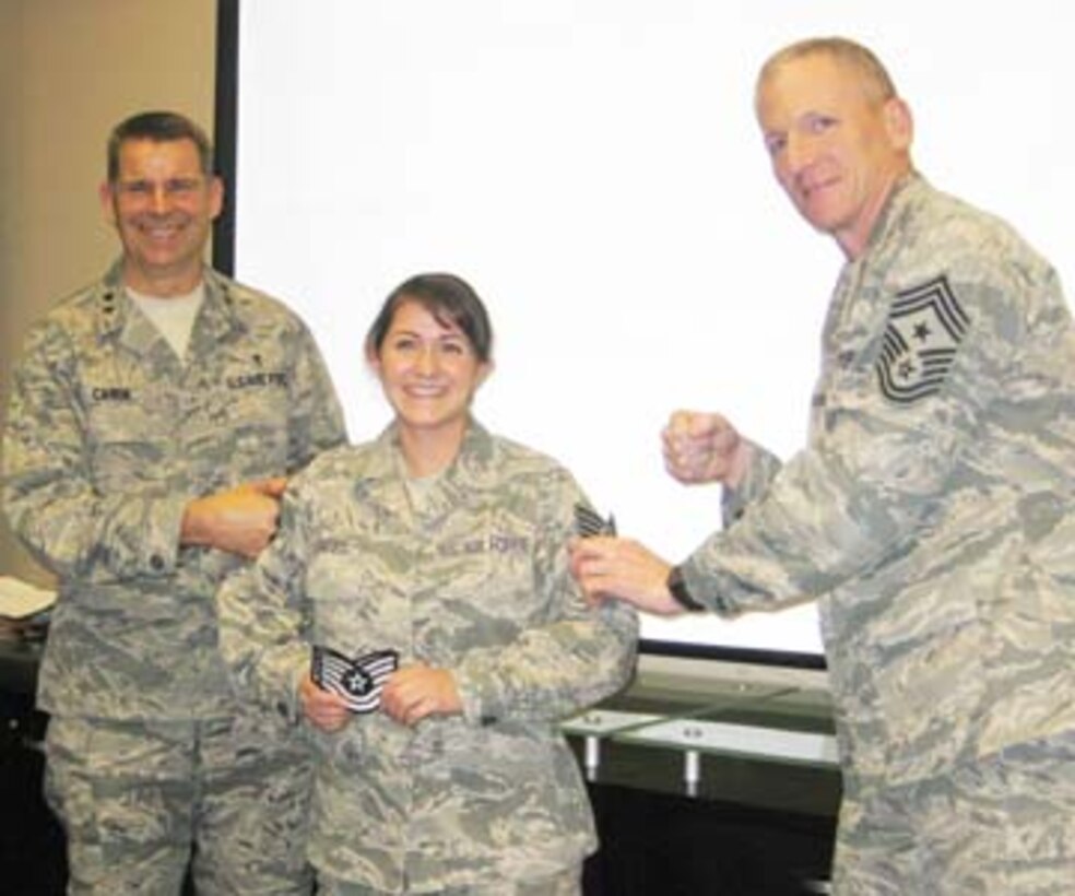 SSgt Stephanie Cates, medical technician with the 779th Medical Group was STEP promoted to Tech Sgt. on Nov 24, 2010 by Maj. Gen. Gerard Caron and Chief Master Sgt. Roddy Hartsook.      