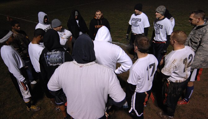 WHITEMAN AIR FORCE BASE, Mo.- The 509th Aircraft Maintenance Squadron's team huddles at halftime during the 2010 intramural flag-football championship here, Nov. 18. (U.S. Air Force photo by Airman 1st Class Cody H. Ramirez)
