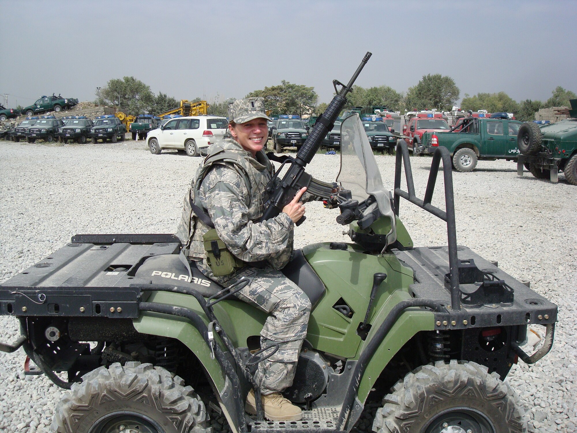 KABUL, Afghanistan -- 1st Lt. Yvonne Nollman, deployed to Afghanistan from the 633d Logistics Readiness Squadron, poses for a photo aboard an all-terrain vehicle while on patrol Aug. 17. Lieutenant Nollman is scheduled to return from Afghanistan in January 2011. (Courtesy photo)