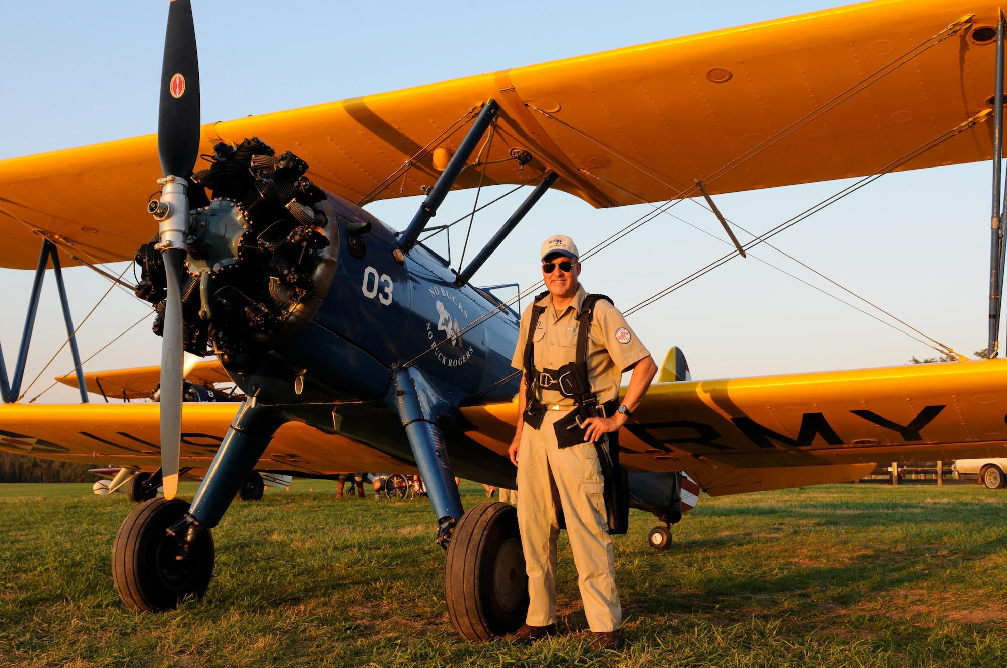 BEALETON, Va. -- Tech. Sgt. Dave Brown, 459th Aeromedical Evacuation Squadron medical material specialist, stands in front of his 1941 PT-17 Stearman after providing open cockpit rides here Oct. 10. When he's not performing his duties as an Air Force Reservist, Sergeant Brown performs aerobatic maneuvers for the Flying Circus air show and provides flight instruction through his business, Brown Aviation. (U.S. Air Force photo/Tech. Sgt. Steve Lewis)