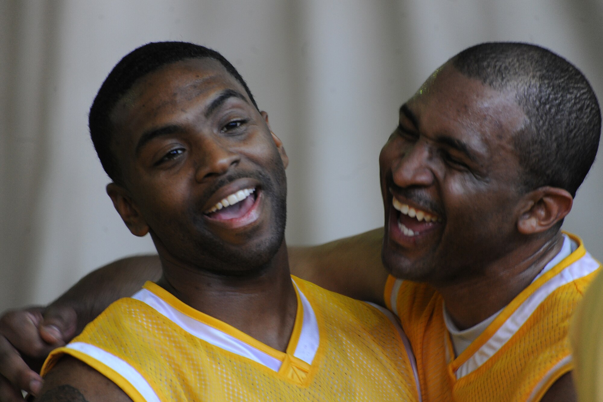 BISHKEK, Kyrgyzstan - Tech. Sgt. Jibiri Perry, Joint Movement Control Center, and Tech. Sgt. Jamal Berry, 728th Aircraft Maintenance Squadron, express enjoyment after a basketball game against the Kyrgyz National University at the Kyrgyz Sports Palace in Bishkek, Nov. 27.  The Kyrgyz National Men's Team defeated the Transit Center team with a final score of 60-42.  (U.S. Air Force photo/Staff Sgt. Nathan Bevier)