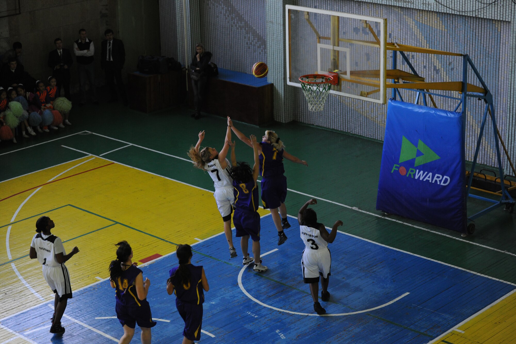 BISHKEK, Kyrgyzstan - 2nd Lt. Rachel Emory, 376th Expeditionary Civil Engineer Squadron, shoots for a basket during a basketball game against the Kyrgyz National University at the Kyrgyz Sports Palace in Bishkek, Nov. 27.  The Transit Center team defeated the Kyrgyz National Women's Team with a final score of 63-49.  (U.S. Air Force photo/Staff Sgt. Nathan Bevier)