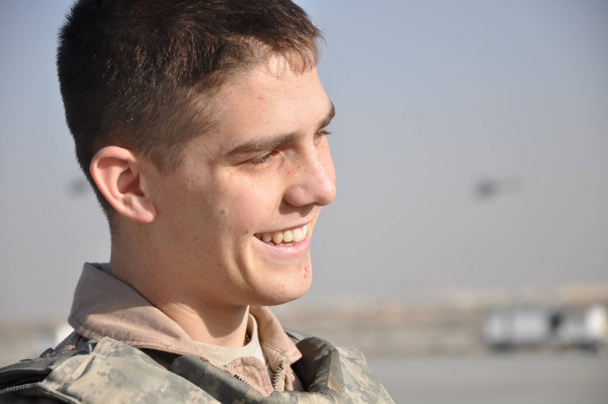 Senior Airman Jordan Gunterman (right), a 379th Air Expeditionary Wing fly away security team leader, discusses base security with a wingman at Bagram Airfield, Afghanistan.  (U.S. Air Force Photo/Capt. Erick Saks)