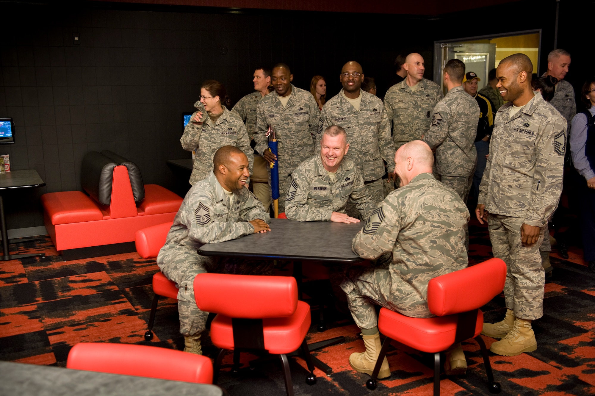 Airmen enjoy the atmosphere of the Collocated Club’s newly renovated enlisted Sports Bar, Nov. 30, 2010, at Misawa Air Base, Japan. The $90,000 renovation project took about one month to complete, with the installation of new carpet, tiling, tables and chairs and an upgraded sound system. (U.S. Air Force photo by Staff Sgt. Samuel Morse/Released)