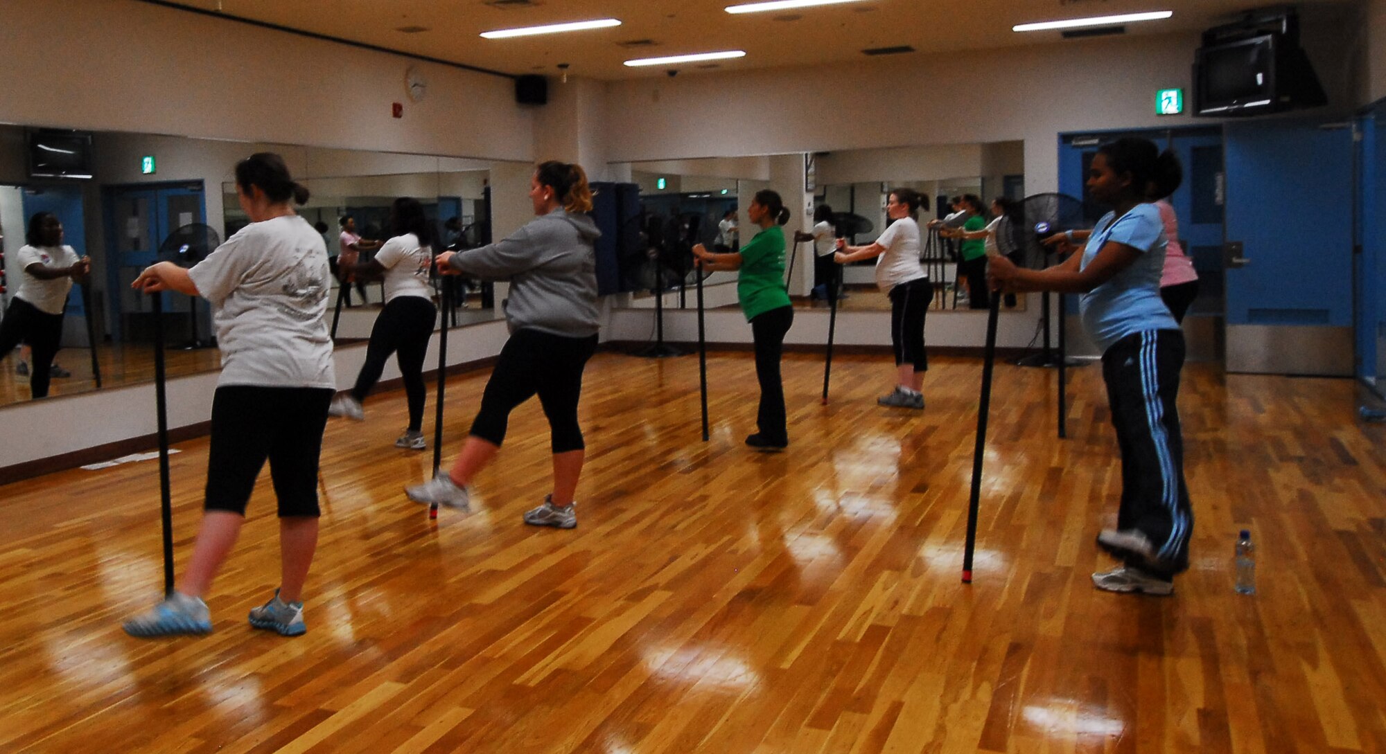 YOKOTA AIR BASE, Japan -- Future moms do standing leg lifts in the prenatal class taught by Staff Sgt. Treshawna Gwendo, diet therapist at the 374th Aerospace Medicine Squadron. 'Fit Moms' is a prenatal class offered at Yokota's Health and Wellness Center, Tuesdays and Thursdays from 3:30 p.m. to 4:30 p.m. (U.S. Air Force photo/Airman 1st Class Lynsie Nichols) 