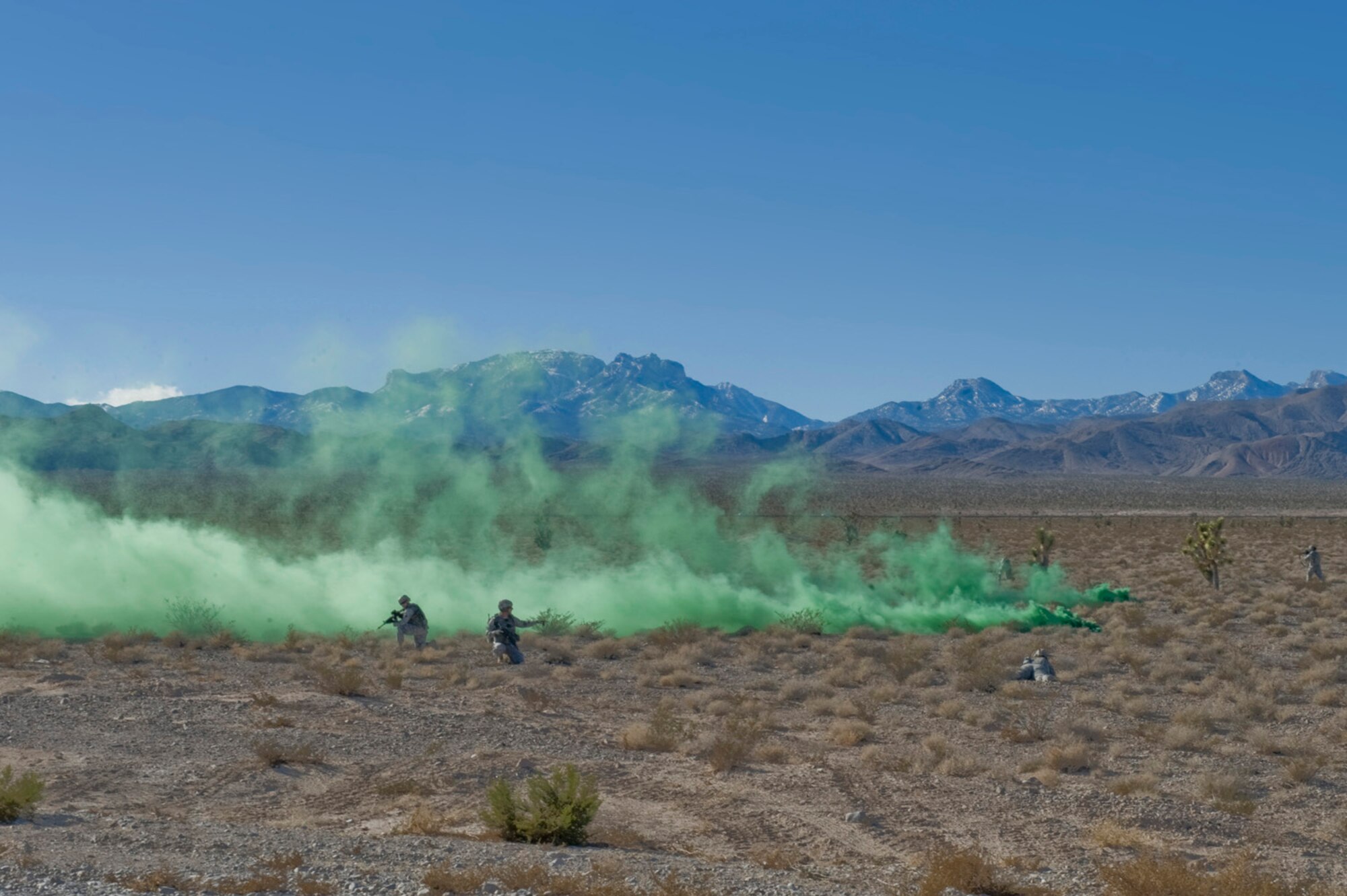 NELLIS AIR FORCE BASE, Nev. – Members of the 99th Ground Combat Training Squadron conduct a demonstration for the Nellis Support Team on the Nevada Test and Training Range. The Nellis Support Team and their guests visited the Nevada Test and Training Range so they could see some of the daily training Nellis conducts on the range, which varies from the GCTS to target practice for our A-10s. (U.S. Air Force photo by Airman 1st Class Jamie Nicley)