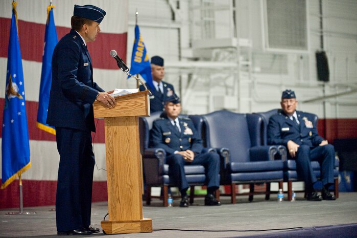 NELLIS AIR FORCE BASE, Nev. -- Maj. Gen. Ted Kresge, outgoing U.S. Air Force Warfare Center commander, gives a farewell speech while Gen. William M. Fraser III, Air Combat Command commander, and Maj. Gen. James W. Hyatt, incoming USAFWC commander, look on during the USAFWC change of command ceremony at Nellis Air Force Base, Nev., Nov. 30. (U.S. Air Force photo by Tech. Sgt. Michael R. Holzworth)