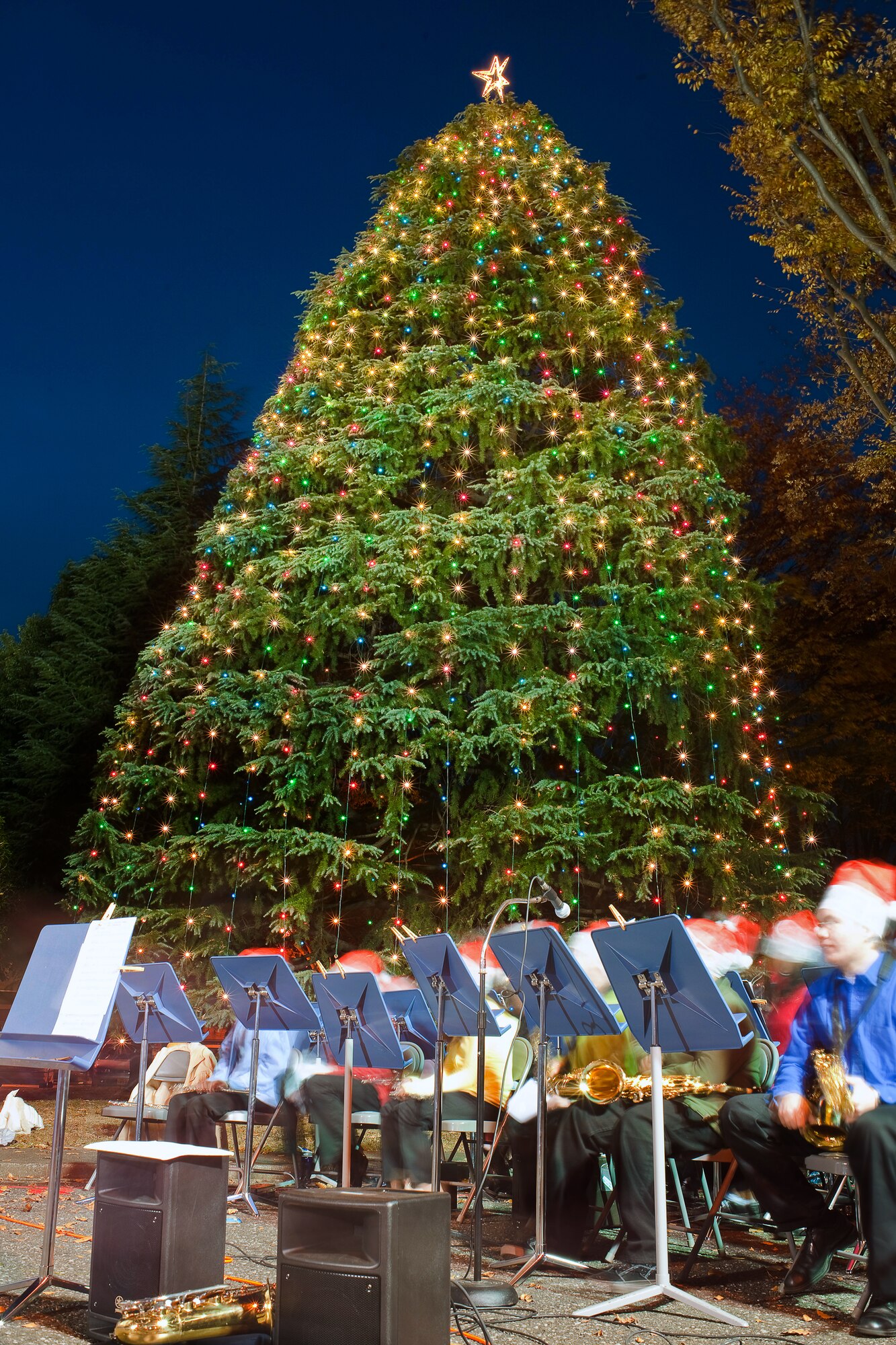 YOKOTA AIR BASE, Japan -- The Yokota Middle School Advanced Band performs holiday carols during the Christmas Tree Lighting Ceremony that was held here Nov. 30 at the Traditional Chapel. (U.S.Air Force photo/Osakabe Yasuo)