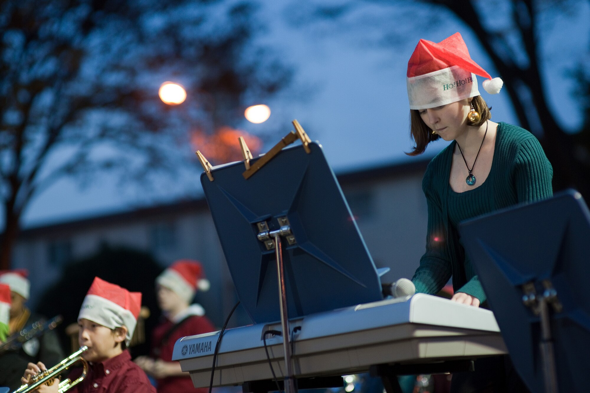YOKOTA AIR BASE, Japan -- Claire Kincaid, Yokota Middle School, performs as a member of Yokota Middle School Advanced Band.  The Yokota Christmas Tree Lighting Ceremony was held Nov.30 at the Traditional Chapel.  (U.S. Air Force photo/Osakabe Yasuo)  