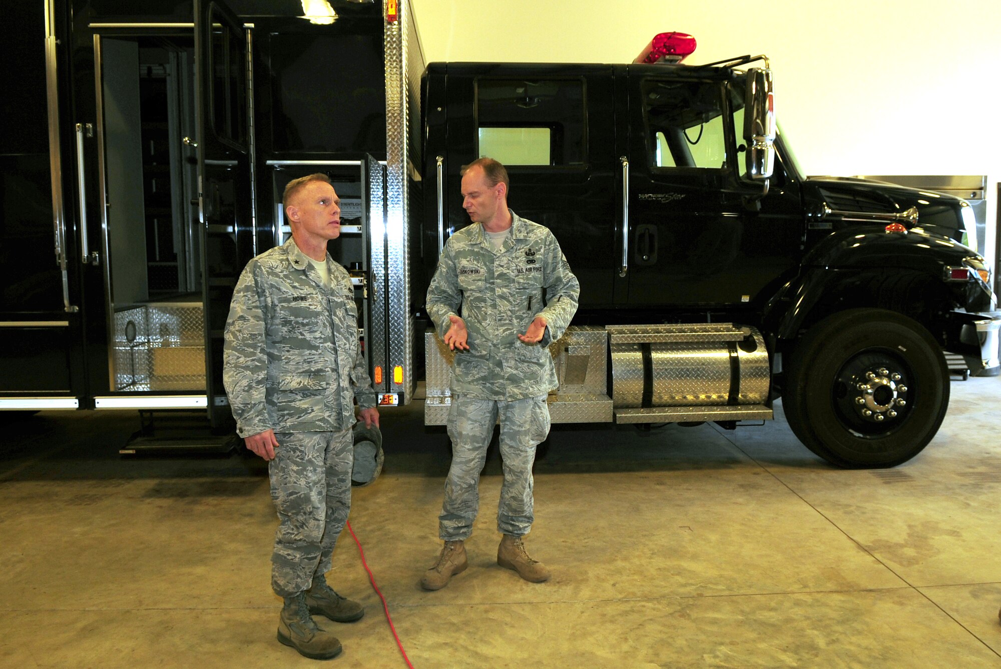 MOODY AIR FORCE BASE, Ga.-- Master Sgt. Michael Laskowski, 23rd Civil Engineer Squadron explosive ordnance disposal operator, gives Brig. Gen. Dave Howe, Air Combat Command director of installations and missions support, a tour of the EOD facility Nov. 30. General Howe's three-day trip included visits to units within 23rd Mission Support Group. (U.S. Air Force photo/Senior Airman Stephanie Mancha)(RELEASED)