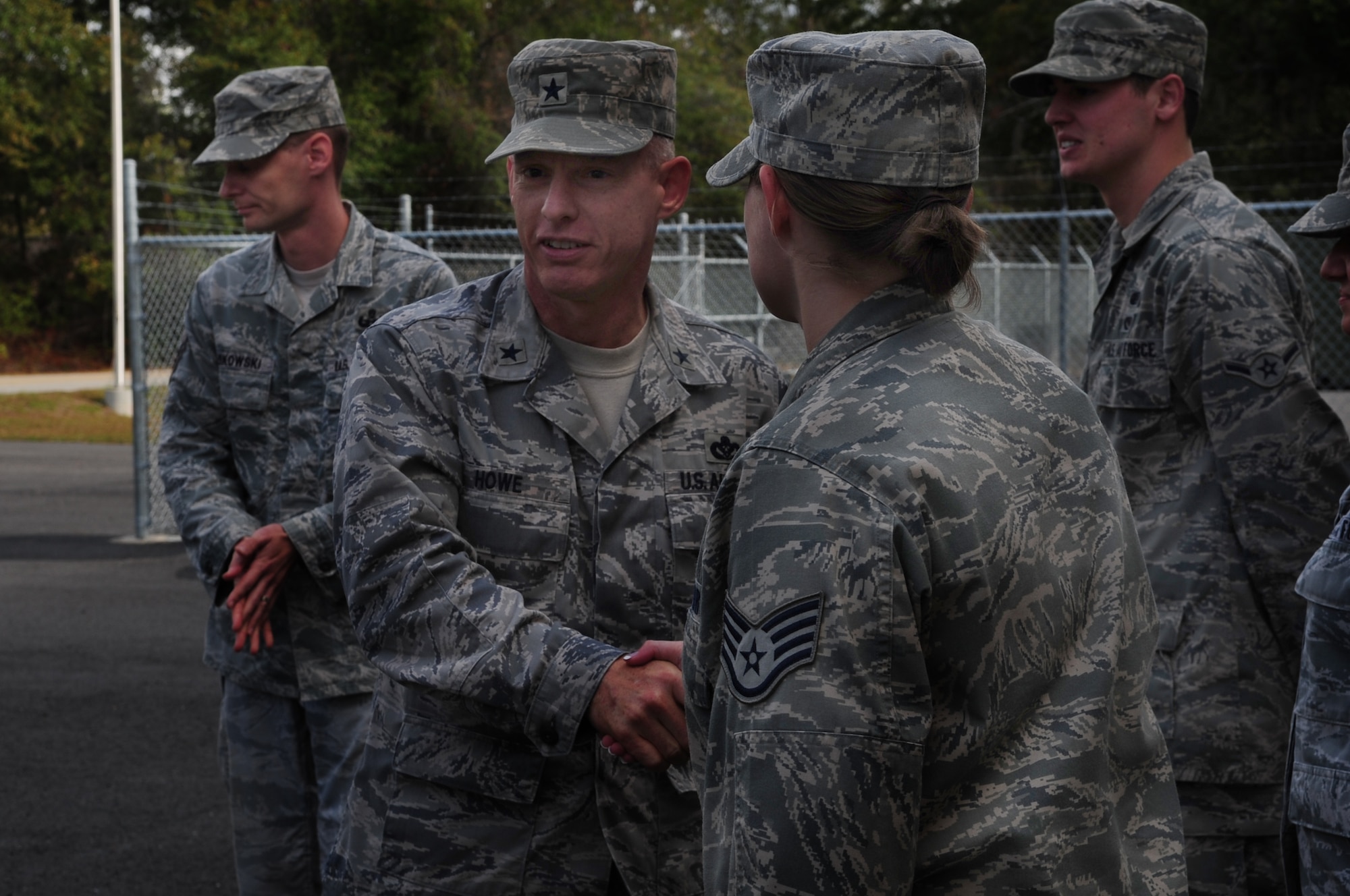 MOODY AIR FORCE BASE, Ga.-- Staff Sgt. Karen Hubley, 23rd Civil Engineer Squadron readiness and emergency management, greets Brig. General Dave Howe, Air Combat Command director of installations and missions support, during his base tour Nov. 30. General Howe's three-day trip included visits to units within 23rd Mission Support Group. (U.S. Air Force photo/Senior Airman Stephanie Mancha)(RELEASED)