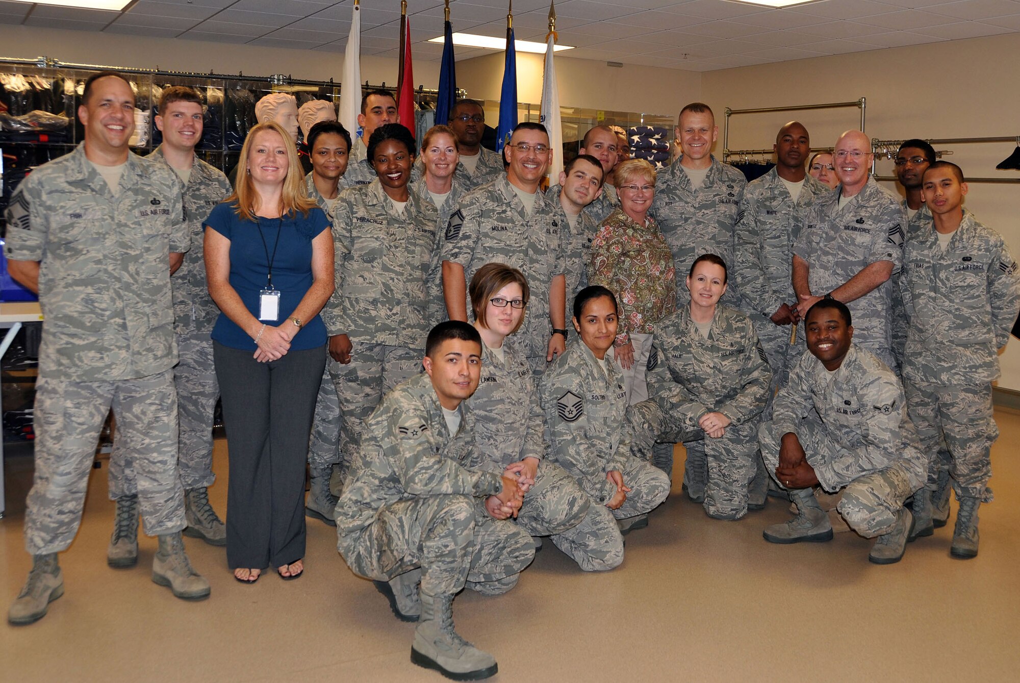 Chief Master Sergeant of the Air Force James Roy, center, recently made a visit to the team at the Air Force Mortuary Affairs Operations Center, Dover Air Force Base, Del. (U.S. Air Force photo/Staff Sgt. Jamie George)