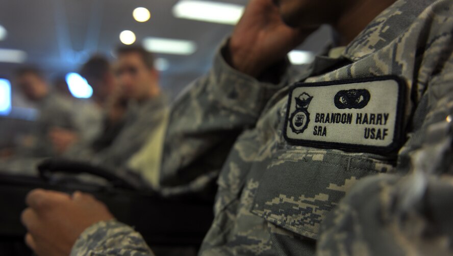 MOODY AIR FORCE BASE, Ga.-- A single patch on the new uniform  of an Airman deploying  from the 824th Base Defense Squadron provides name, rank and military branch. The new uniform is lighter, more comfortable and allows for easy access to pockets versus the everyday Airman Battle Uniform. (U.S. Air Force photo/Airman 1st Class Joshua Green)(RELEASED)
