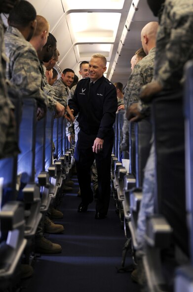 MOODY AIR FORCE BASE, Ga.-- Brig. Gen. Dave Howe, Air Combat Command director of installations and mission support, shakes hands with members of the 824th Base Defense Squadron before they depart for their recent deployment. General Howe thanked them for their service and wished them a safe return. (U.S. Air Force photo/Airman 1st Class Benjamin Wiseman)(RELEASED)
