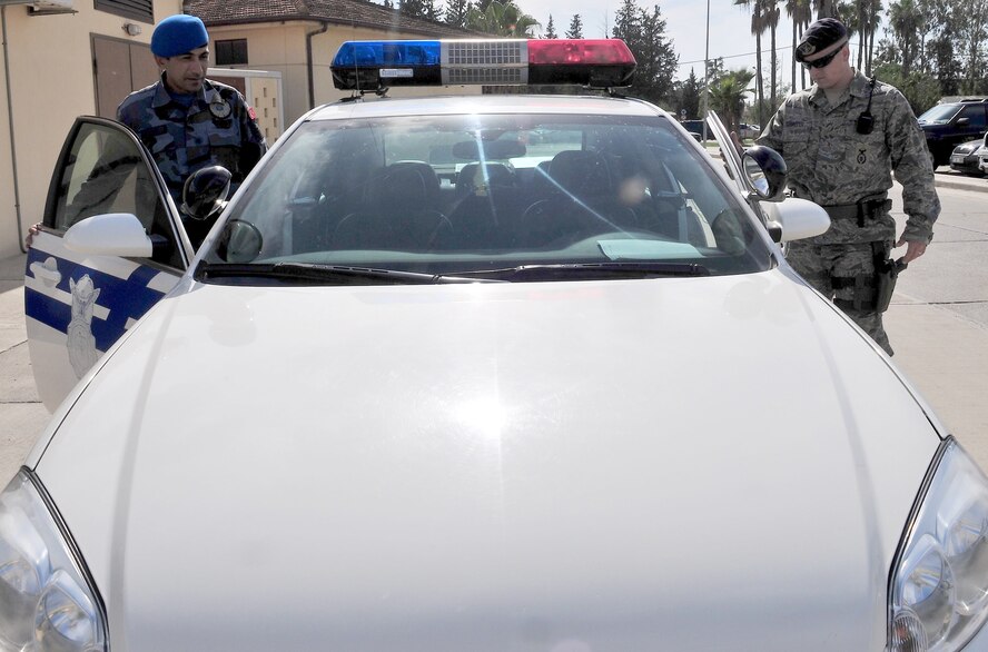 Staff Sgt. Ryan Schaefer (left), and a Turkish Air Force Security Forces patrolman, ride together during joint patrol Oct. 22, 2010, around Incirlik Air Base, Turkey. (U.S. Air Force photo/Senior Airman Ashley Wood)