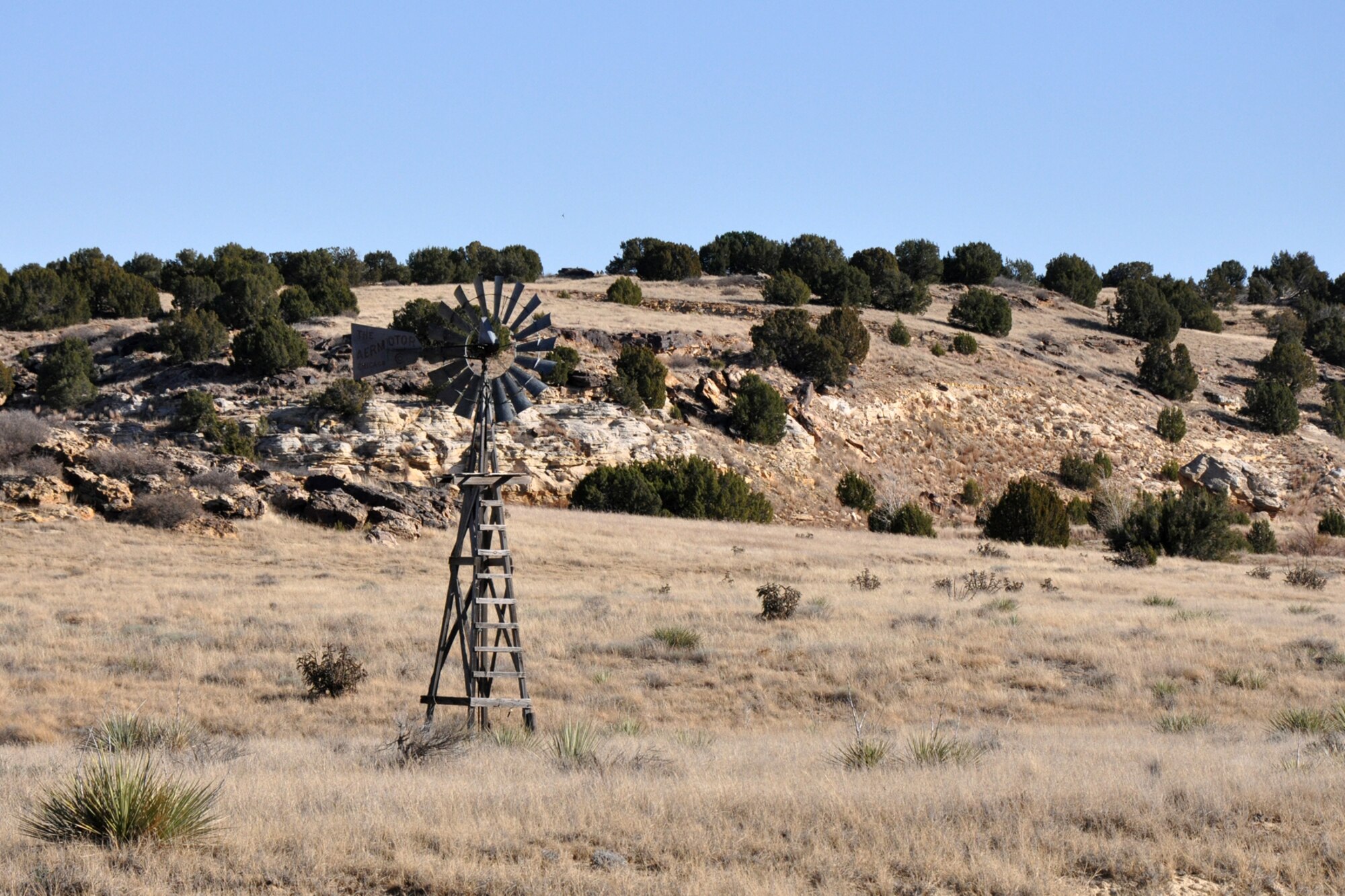 A lone windmill stands above the brush in the southeastern part of the Comanche National Grassland located near Springfield, Colo., Nov 21, 2010. The Comanche were nomad buffalo hunters and were constantly on the move. They cultivated little from the earth and lived in skin tipis. They have long been noted as the finest horsemen of the plains and bore a reputation for their courage. (Courtesy photo/Jeff Walston)