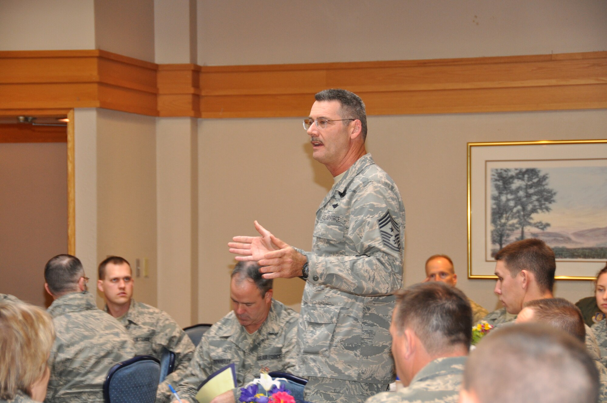 Chief Master Sgt. Mark Koenig, 934th Airlift Wing command chief, talks to 934th Airlift Wing members at the wing enlisted workshop Nov. 8. (Air Force Photo/Staff Sgt. Kimberly Hickey)