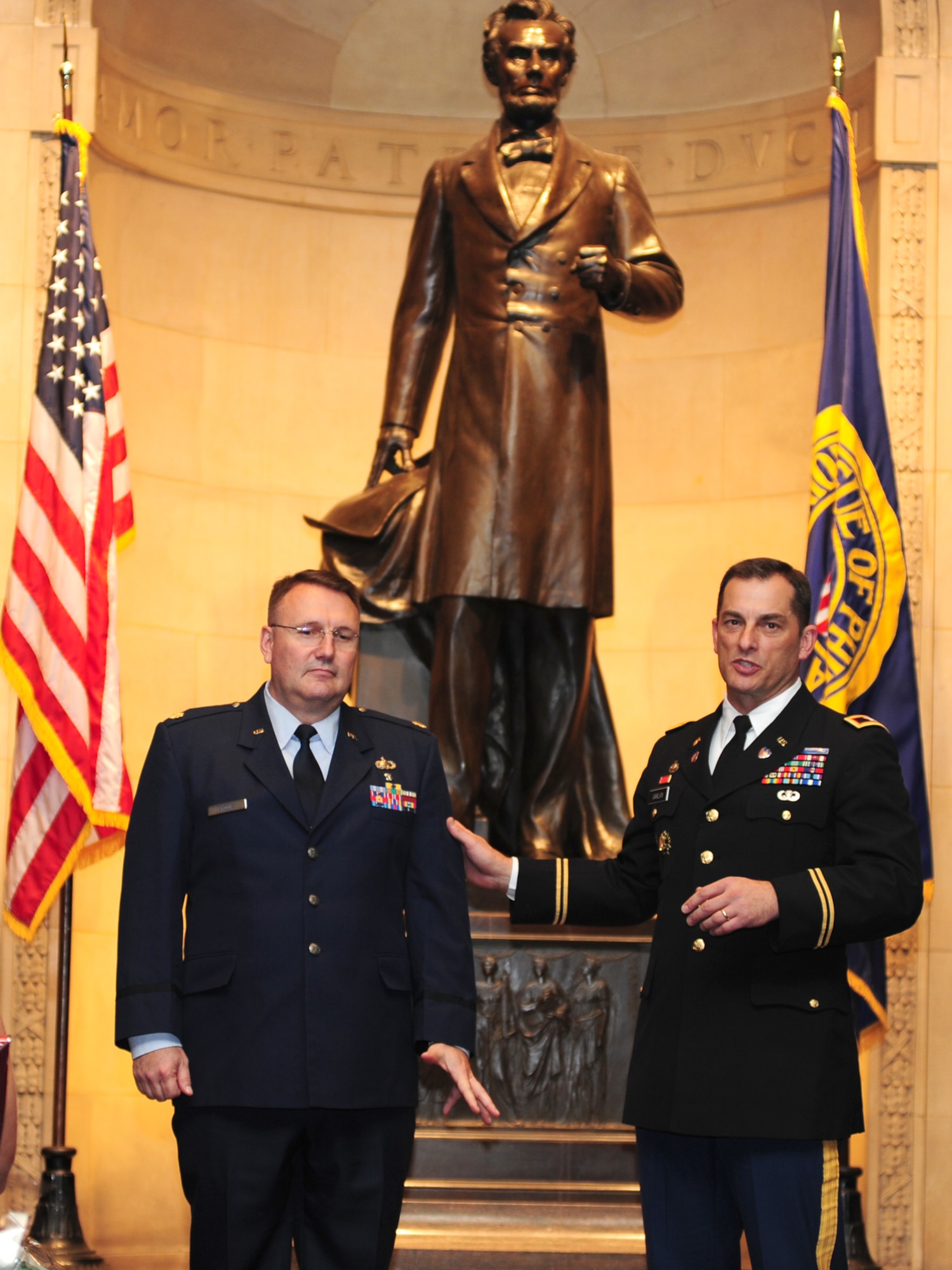 U.S. Army Col. Todd Garlick, U.S. Military Entrance Processing Command, Eastern Sector commander, reflects on the tenure of U.S. Air Force Maj. Jerry Brooks, outgoing Military Entrance Processing Station at Joint Base McGuire-Dix-Lakehurst commander, during the station’s change-of-command ceremony Nov. 23 at the Union League in Philadelphia. U.S. Air Force Lt. Col. Michael Goodwin takes over the station, which serves Delaware, eastern Pennsylvania and central and southern New Jersey. (U.S. Air Force photo/Staff Sgt. Zachary Wilson)