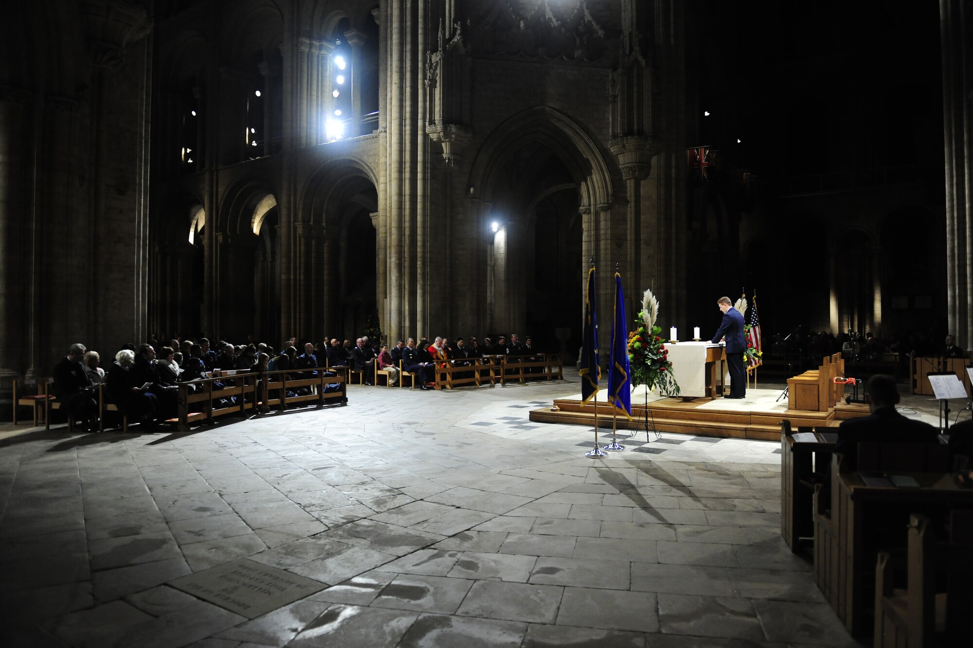 ELY, United Kingdom – Chaplain (Capt.) Matthew Glaros, a Catholic chaplain with the 48th Fighter Wing Chapel, bows his head in prayer during a Thanksgiving service at the Ely Cathedral on Nov. 24. The 24th Annual Thanksgiving Service was attended by approximately 600 Americans from Royal Air Forces Lakenheath, Mildenhall and Feltwell as well as their British neighbors. (U.S. Air Force photo/Senior Airman Stephen Linch) 