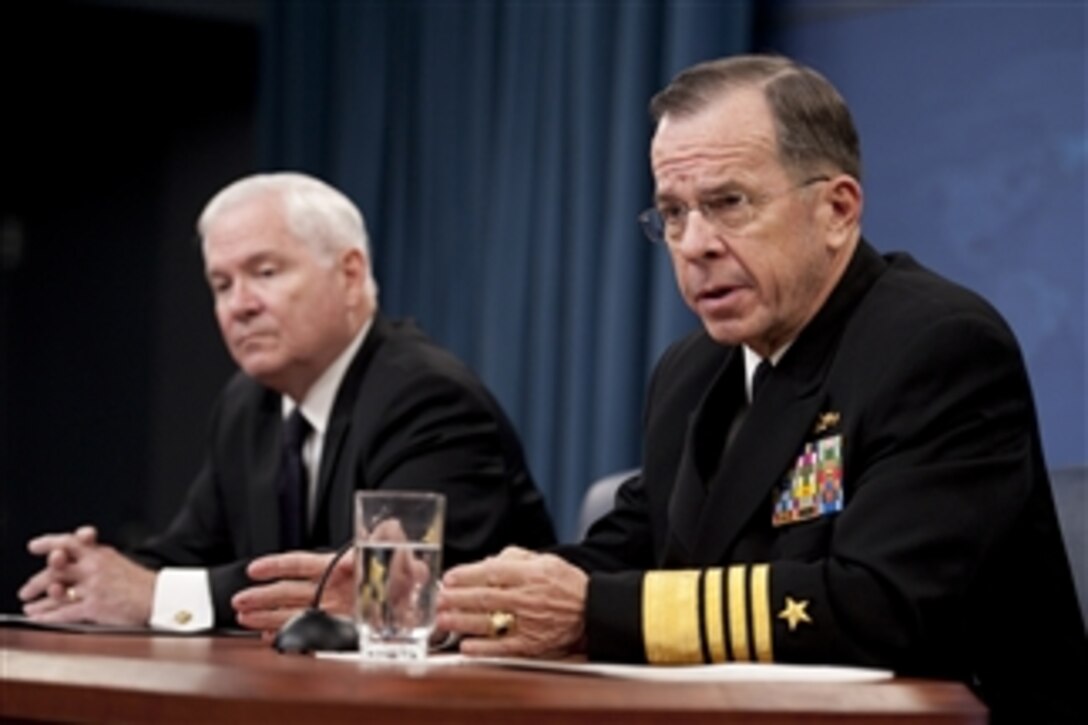 Secretary of Defense Robert M. Gates and Chairman of the Joint Chiefs of Staff Adm. Mike Mullen, U.S. Navy, conduct a press briefing in the Pentagon discussing the public release of the "Don't Ask, Don't Tell" Comprehensive Working Group report on Nov. 30, 2010.  