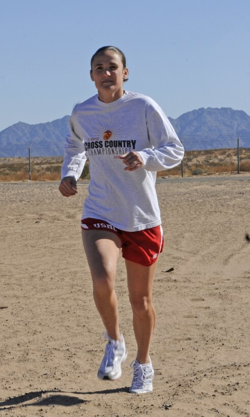 1st Lt. Erin Demhko, 25, Marine Wing Support Squadron 371 engineer operations company commander, runs at the Cannon Air Defense Complex in Yuma, Ariz., Nov. 30, 2010. Demchko has participated in many Challenger Cup events, which pit British Royal Marines against U.S. Marines.
