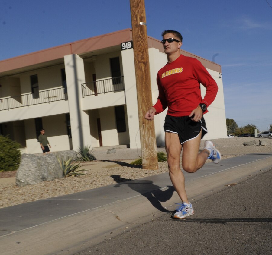 Gunnery Sgt. Scott Hubbard, 35, criminal investigation division chief investigator, runs on the Marine Corps Air Station in Yuma, Ariz., Nov. 30, 2010. Hubbard is in the top 1 percent of marathon runners in the world, breaking the three-hour-finish mark in the Marine Corps Marathon.