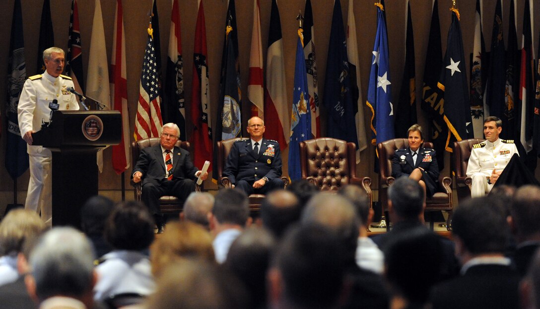 Navy Rear Adm. Tim Alexander talks about the history of Naval Weapons Station Charleston at the Joint Base Charleston inaugural ceremony Oct. 1, 2010, on the JB CHS-Weapons Station in South Carolina. Other guest speakers and distinguished guests included 18th Air Force Commander Lt. Gen. Robert Allardice, 628th Air Base Wing Commander Col. Martha Meeker, 628 ABW Deputy Commander Navy Capt. Ralph Ward, South Carolina Senator Lindsey Graham and South Carolina Congressman Henry Brown. Admiral Alexander is the Naval Region Southeast Commander. (U.S. Air Force photo/Senior Airman Timothy Taylor)