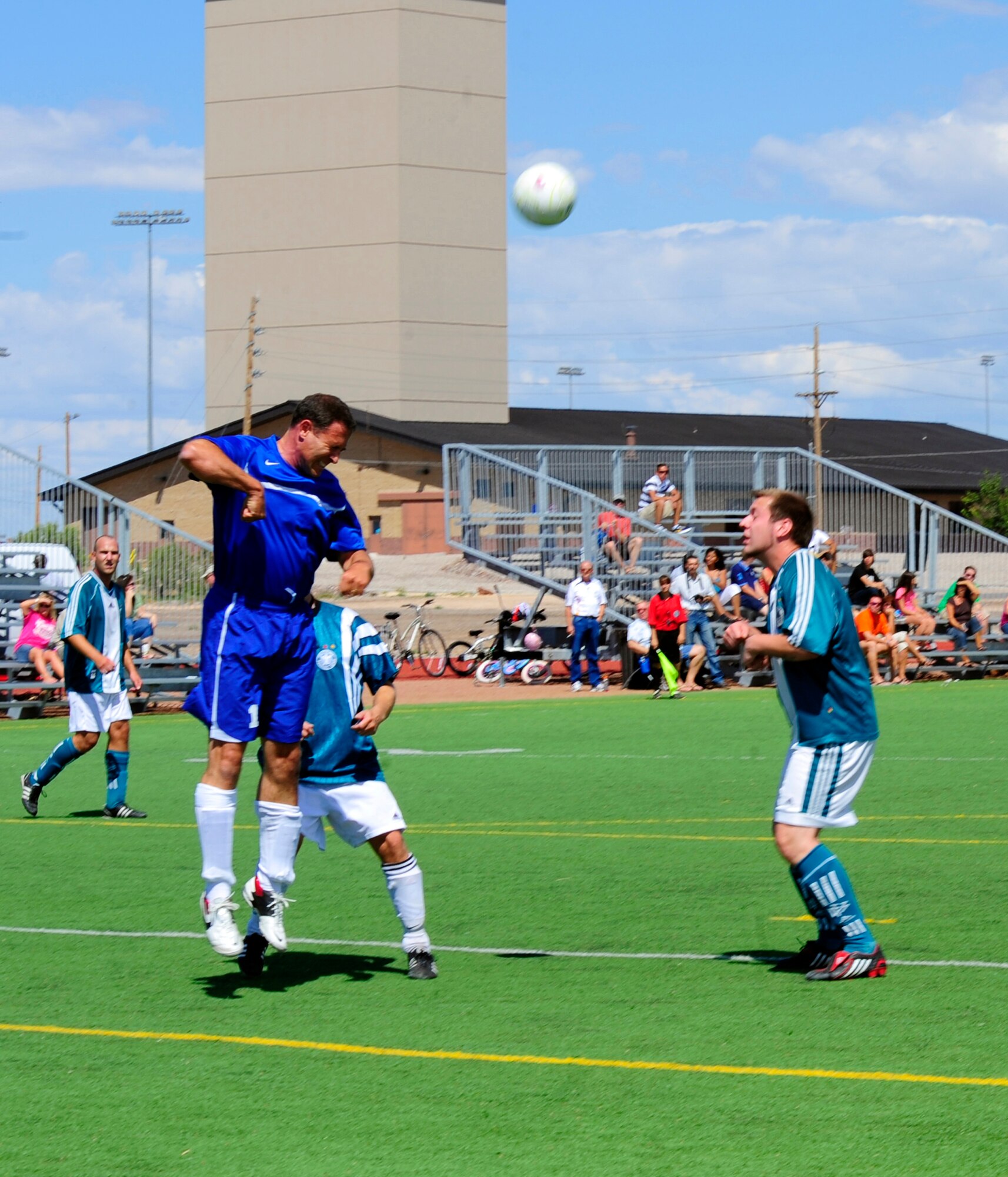 HOLLOMAN AIR FORCE BASE, N.M. -- Col. David Krumm, 49th Wing commander, heads the ball during the Oktoberfest International Soccer Match against the German Air Force Flying Training Center Sept. 25, 2010. The international soccer game between the U.S. Air Force and GAF was an opening event to the Oktoberfest activities that ensued later that evening. (U.S. Air Force photo by Senior Airman Tiffany Trojca / Released)