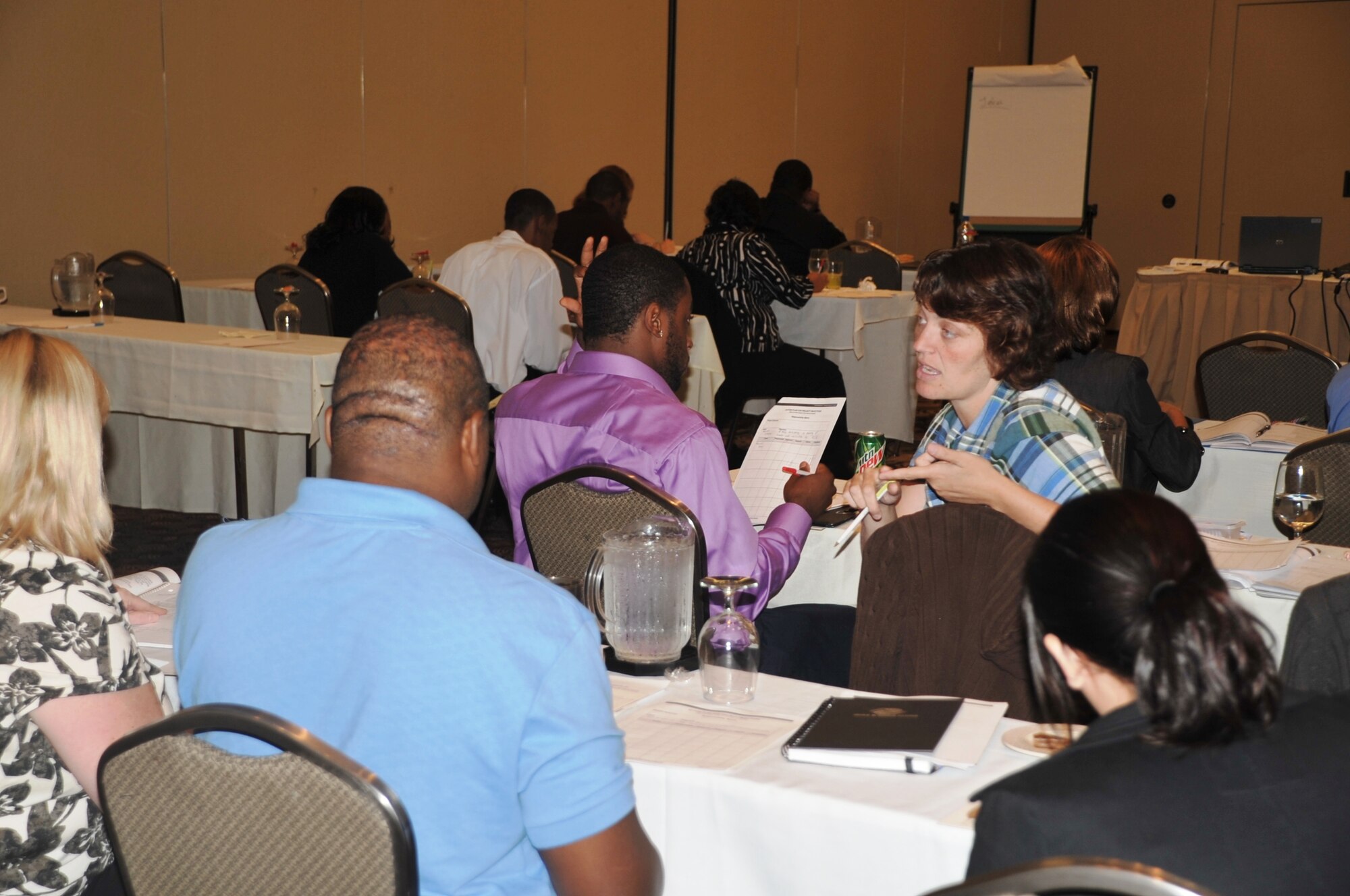 More than 30 youth coordinators from Air Mobility Command bases participate in a Boys and Girls Club of America advanced leadership training course in O'Fallon, Ill., on Sept. 23, 2010. Each participant arrived to the training with a project for their respective base's youth or teen center. During the training they learn how to advance their project into fruition. (U.S. Air Force Photo/Master Sgt. Scott T. Sturkol)