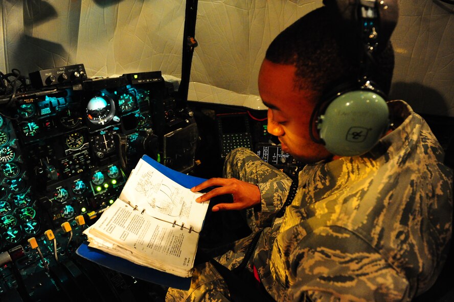 DYESS AIR FORCE BASE, Texas—Senior Airman Billy Pryor, 317th Maintenance Squadron fuel systems repair, looks through his training guide here Sept. 28. Airman Pryor works through the night to make sure planes are adequately fueled for their next flight. This is mission essential due to the many hours planes spend in the air carrying troops, equipment and cargo to wherever needed. (U.S Air Force photo/ Airman 1st Class Shannon Hall)