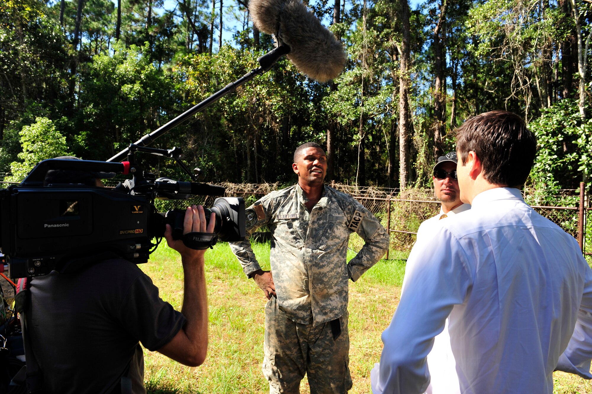 Jalen Rose, an ESPN/NBA analyst, does an interview with Josh Elliott, an ESPN anchor about his experience going through ?The Jungle,? the Tactical Air Control Party (TACP) training course at Hurlburt Field Fla., Sept. 29, 2010. ESPN along with many other media oulets are visiting Hurlburt Field to document the Miami HEAT?s training camp that?s taking place at the Aderholt Fitness Center from Sept. 28 through Oct. 3, 2010. (DoD Photo by Staff Sgt. Stephanie Jacobs/RELEASED)
