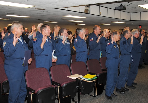 Seventy-five new government employees were sworn in today during a government employee orientation held in the 8th Flying Training Squadron’s auditorium at Vance AFB. Government employees take an oath very similar to the one enlisted and commissioned Airmen take when entering the military. Of the 75 new employees, 73 are flight simulator operators and two are support clerks. (U.S. Air Force photo/ 2nd Lt. Tyler Gross)