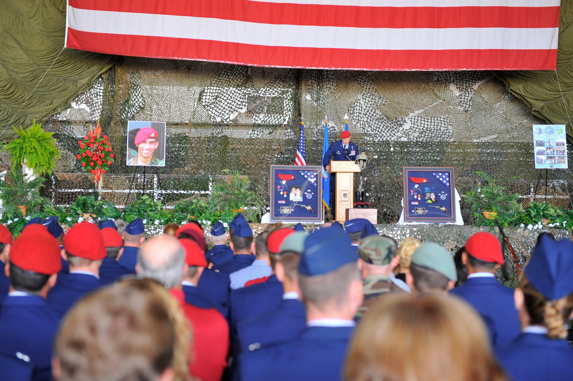 U.S. Air Force Maj. Christopher Larkin, 23rd Special Tactics Squadron commander, speaks to the audience during Senior Airman Daniel Sanchez's memorial service at Hurlburt Field, Fla., Sept. 28, 2010. Airman Sanchez, Air Force Special Tactics Combat Controller assigned to the 23rd STS, was killed in action in Afghanistan, Sept. 16, 2010. (DoD photo by U.S. Air Force Senior Airman Sheila deVera/RELEASED)
