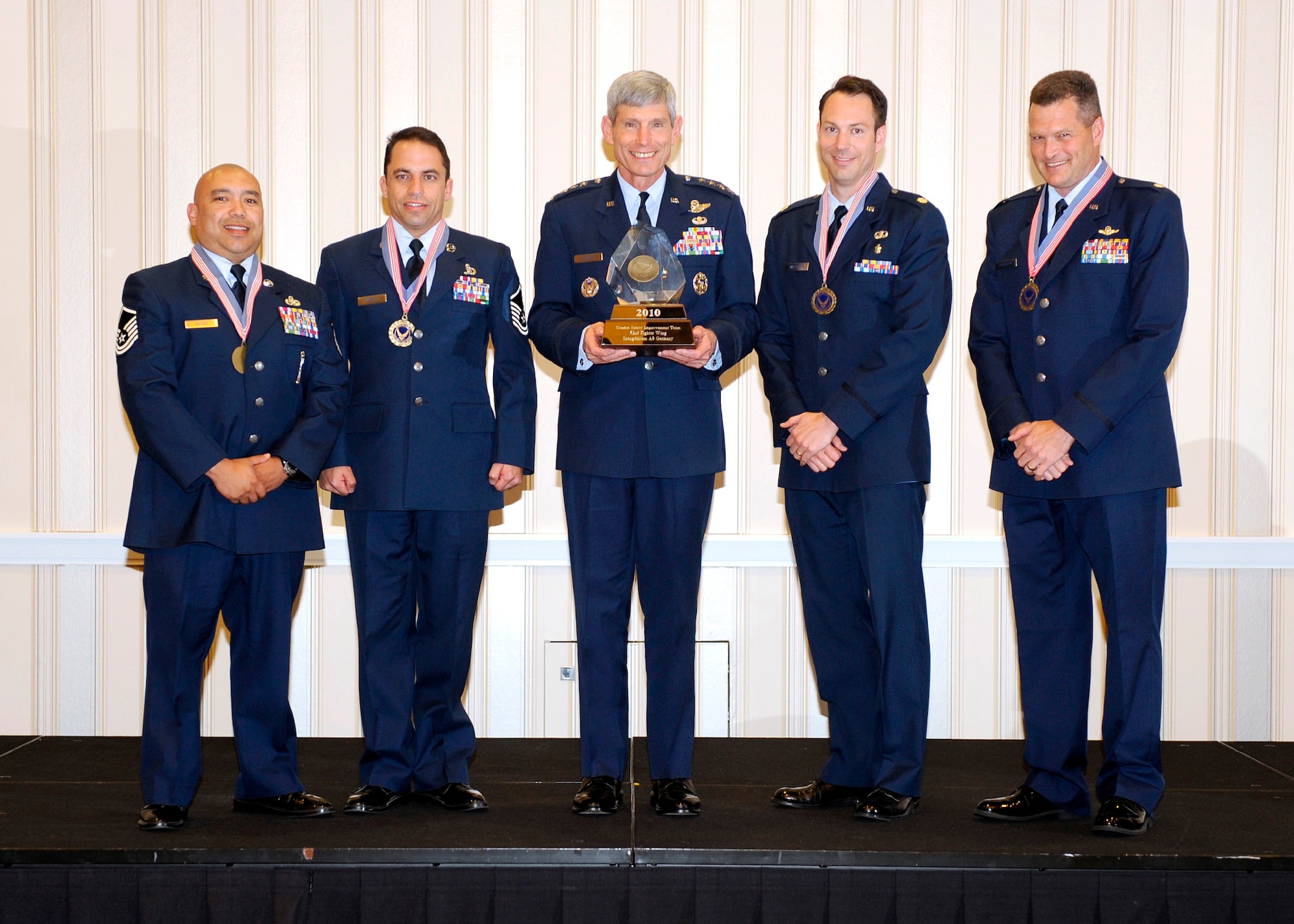 (From left to right) Master Sgt. Richard Valdez, Master Sgt. Joseph Winfield, Air Force Chief of Staff Gen. Norton Schwartz, Maj. Nathan Maertens and Lt. Col. James Thompson from the 52nd Fighter Wing Combat Safety Improvement Team at Spangdahlem Air Base, Germany, receive their Air Force CSAF Team Excellence Award. (Courtesy photo) 