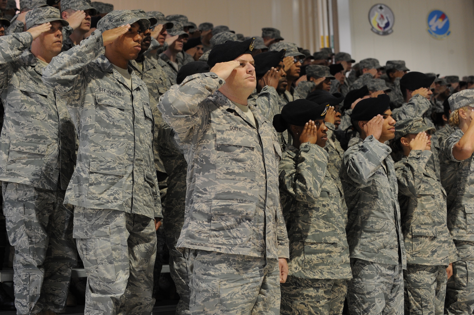 LANGLEY AIR FORCE BASE, Va - 633d Air Base Wing personnel render a salute during a ceremony declaring Full Operational Capability for Joint Base Langley-Eustis  Oct. 1.  After eight months of consolidations and transitions during the Initial Operational Capability period, JBLE has acgueved FOC status. (U.S. Air Force Photo/Staff Sgt. Tabitha Kuykendall)(RELEASED)  
