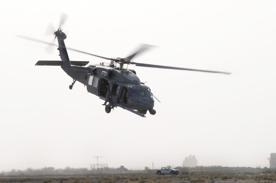 An HH-60G Pave Hawk helicopter, flown by Airmen of the 26th Expeditionary Rescue Squadron, takes off on a mission Oct. 1, 2010, at Kandahar Airfield, Afghanistan. Airmen of the 26th ERQS conduct combat search and rescue missions as well as transporting injured military members and civilians for medical treatment.  (U.S. Air Force photo by Tech. Sgt. Chad Chisholm/Released)