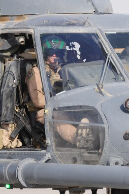 KANDAHAR AIRFIELD, Afghanistan -- Maj. Russell Cook taxies an HH-60G Pave Hawk helicopter during a mission Oct. 1, 2010, at Kandahar Airfield, Afghanistan. Major Cook is a pilot with the 26th Expeditionary Rescue Squadron. (U.S. Air Force photo/Tech. Sgt. Chad Chisholm)
