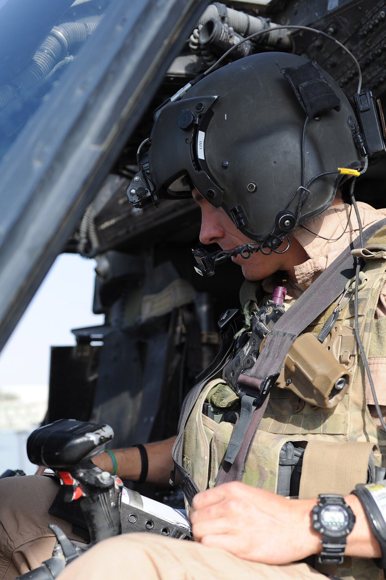 First Lt. Sky Jensen performs preflight procedures while preparing for a mission Oct. 1, 2010, at Kandahar Airfield, Afghanistan.  Lieutenant Jensen is a co-pilot with the 26th Expeditionary Rescue Squadron and hails from Salt Lake City.  (U.S. Air Force photo by Tech. Sgt. Chad Chisholm/Released)
