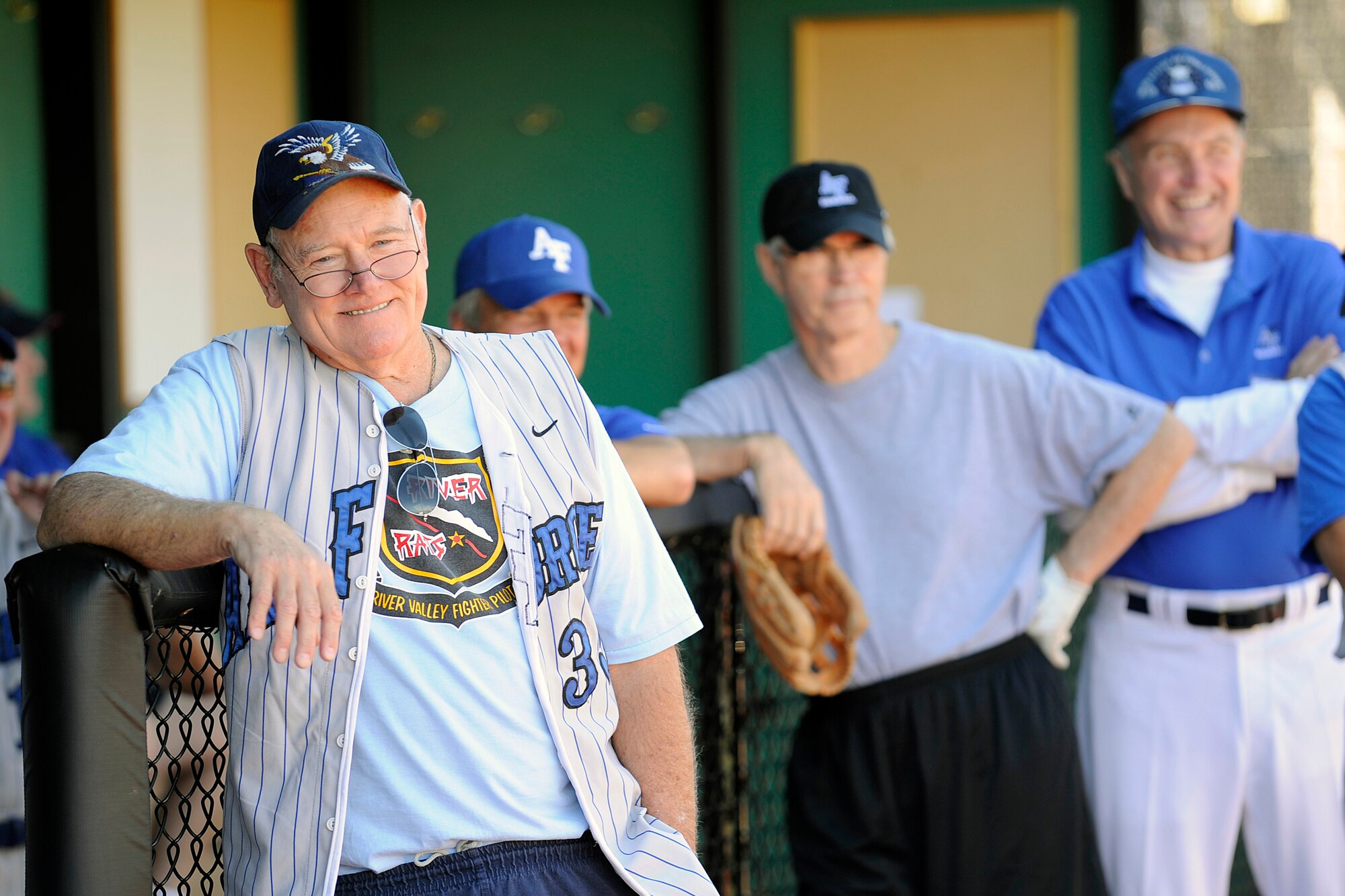 Bruce Huneke watches an Air Force baseball reunion game Sept. 24, 2010, along with Allan Macartor and Jim Steed. Huneke is a 1965 Academy graduate and Vietnam veteran; Macartor and Steed are both 1964 graduates. (U.S. Air Force photo/Mike Kaplan)
