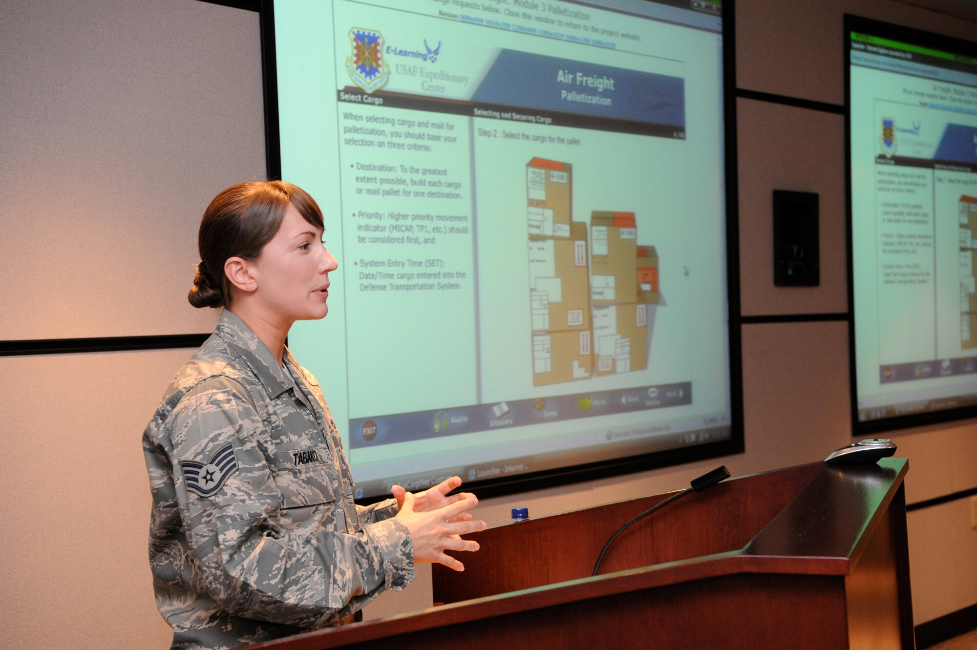 Staff Sgt. Robyn Tabako, an instructor at the U.S. Air Force Expeditionary Center, addresses a group of civic leaders during the center’s Outreach Day July 21 at Joint Base McGuire-Dix-Lakehurst, N.J. Sergeant Tabako was recognized by the National Defense Transportation Association  instructor of the year award for 2009 last week in a ceremony in Baltimore, Md. (U.S. Air Force photo by Carlos Cintron/Released)