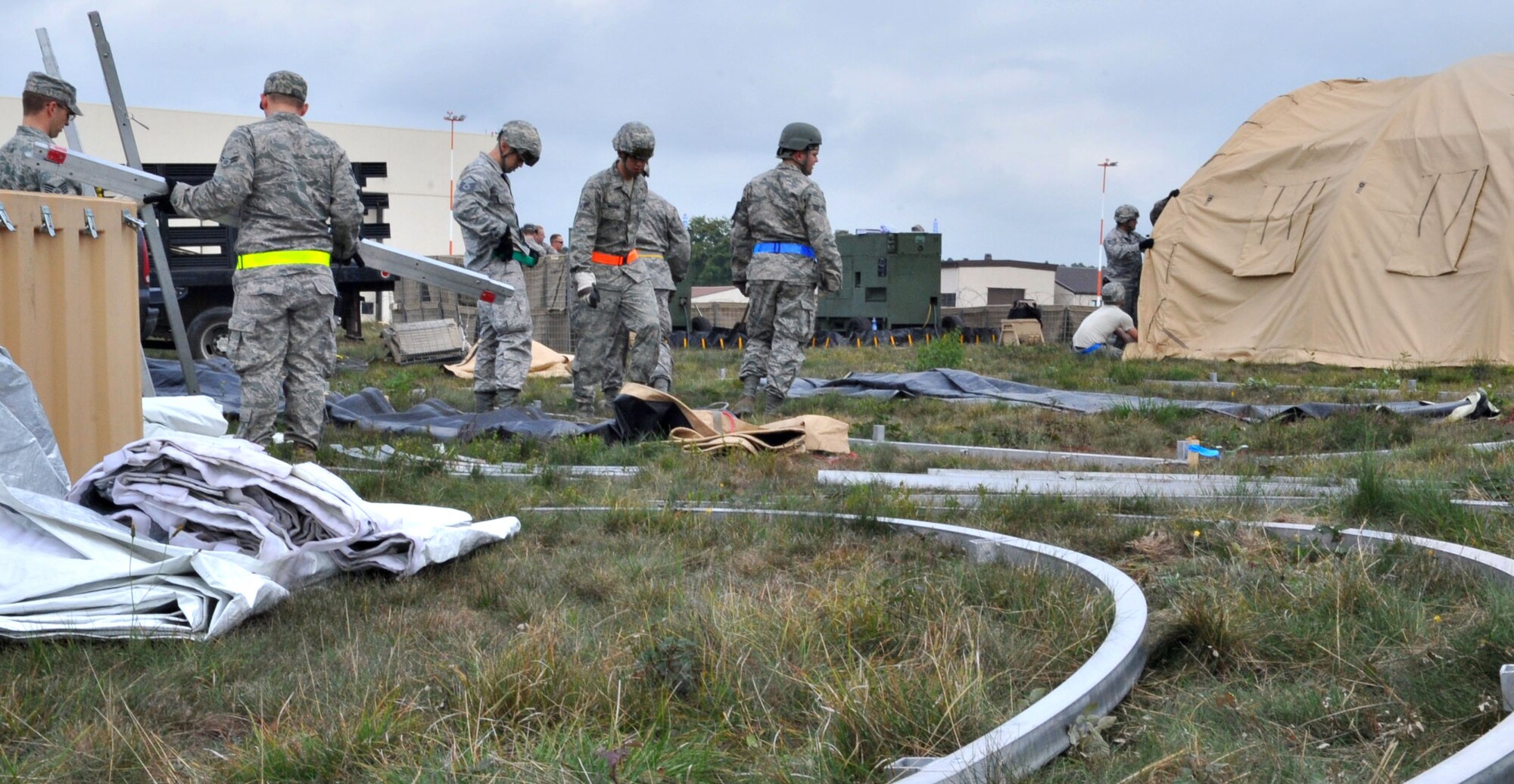 U.S. Air Force 786th Civil Engineer Squadron personnel participate in a simulated 'bed-down' during the Operational Readiness Inspection, Ramstein Air Base, Germany, Oct. 1, 2010. The ORI is designed to test Airmen's ability to survive, operate and perform fundamental duties in a war time environment. (U.S. Air Force photo by Airman 1st Class Desiree Esposito/Released)