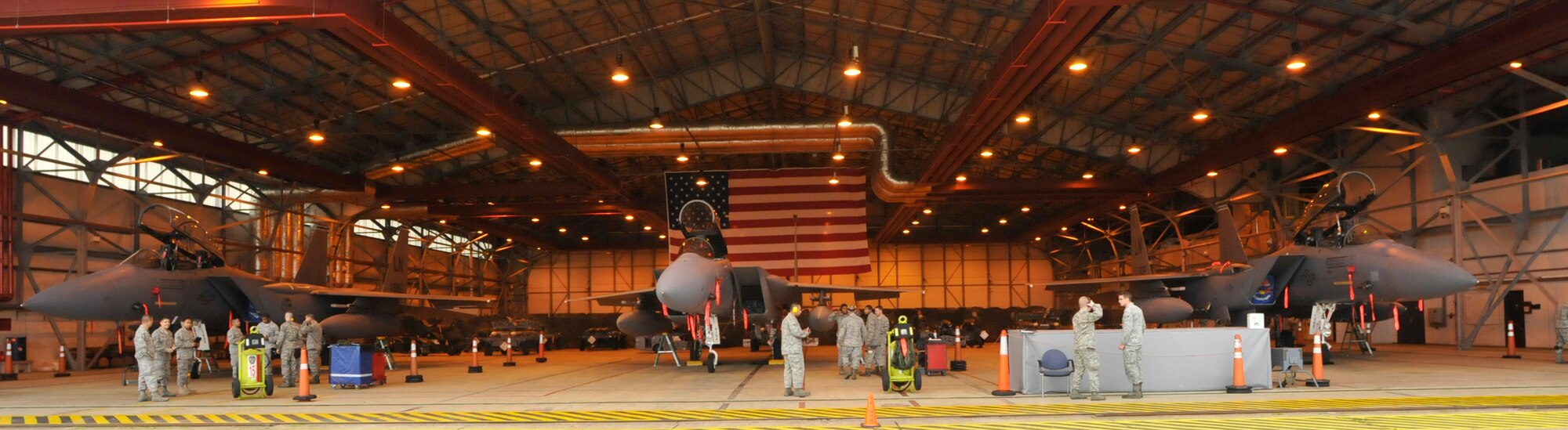 The best aircraft armament systems weapons crew from each fighter squadron here makes sure everything is safe on their respective jets and get ready for the 3rd Quarter Weapons Load Competition at Hangar 6 Oct. 1. The 492nd Fighter Squadron had the fastest time of 26 minutes, 50 seconds. out of the allotted 40 minutes. (U.S. Air Force photo/Airman 1st Class Eboni Knox)