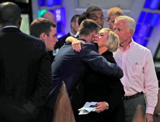 Linda and Van Henning receive hugs and condolences from cadets during a memorial service for their son, Cadet 1st Class Marc Henning, at the Air Force Academy Cadet Chapel Sept. 28, 2010. Cadet Henning, a native of Crossville, Ill., was 22. He attended the Academy Preparatory School in 2006 before entering the Academy in 2007. (U.S. Air Force photo/Bill Evans)