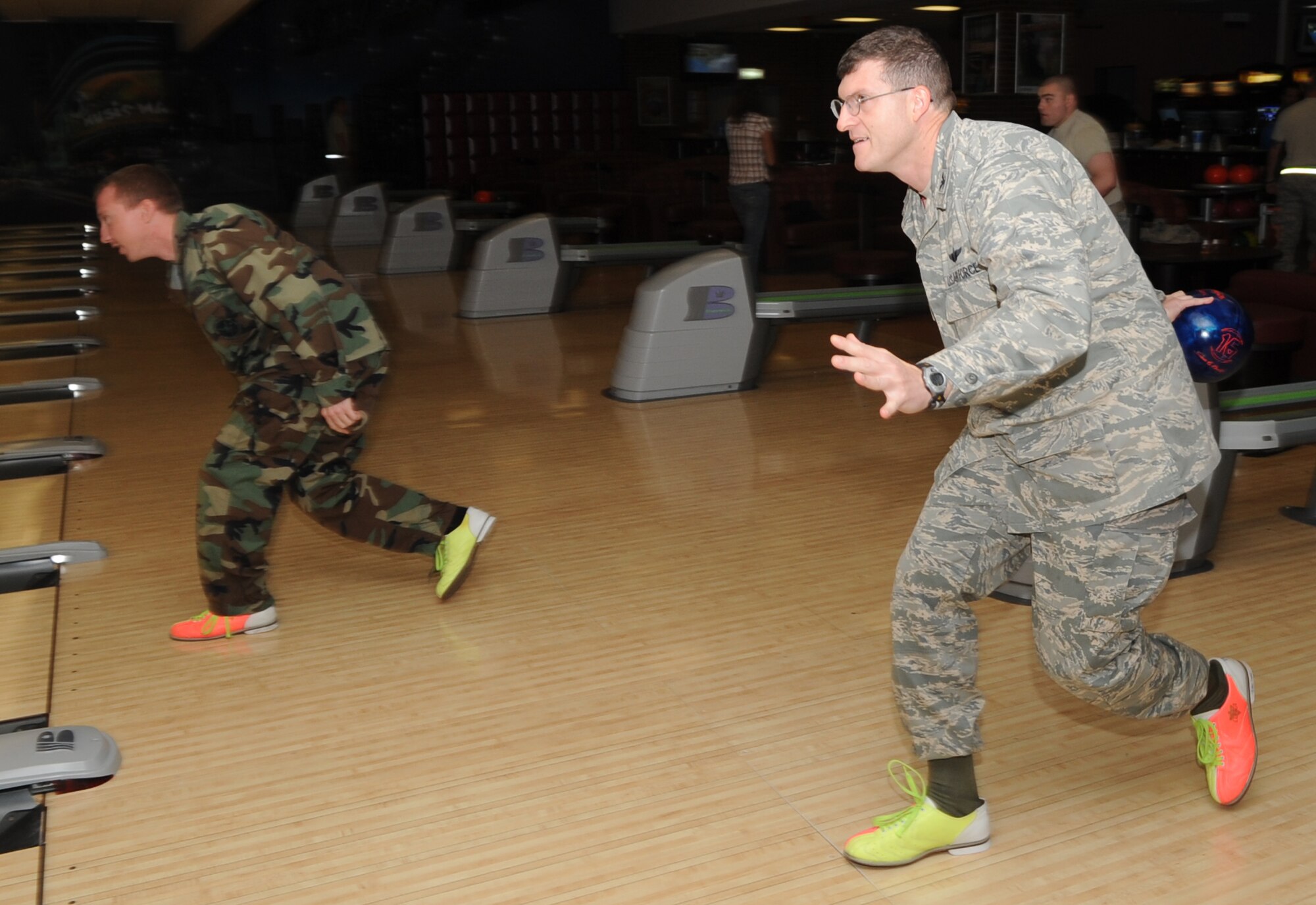 SPANGDAHLEM AIR BASE, Germany – Capt. Jeremy Bruner, 52nd Medical Operations Squadron dentist, bowls with Col. Clinton Hinote, 52nd Fighter Wing vice commander, during a Combined Federal Campaign “kick-off” fundraiser Sept. 30. Capt. Bruner coordinated the bowl-athon for the CFC which raised money for charitable organizations  on the base. (U.S. Air Force photo/Senior Airman Nick Wilson)
