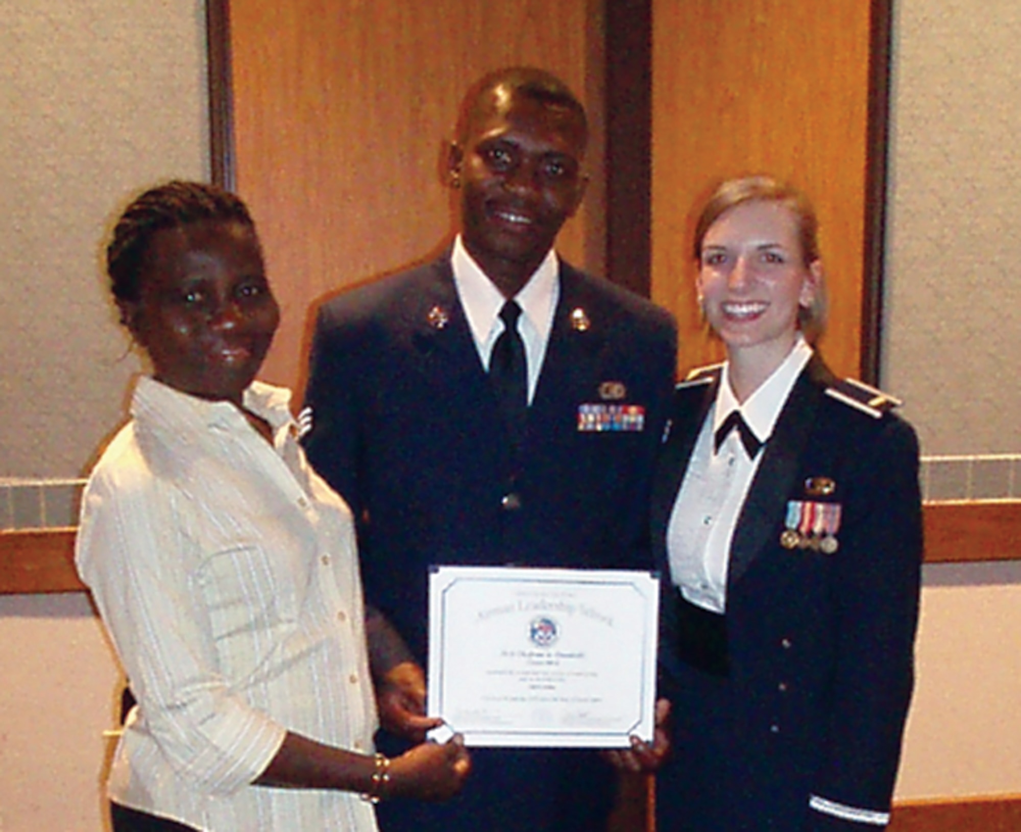 Staff Sgt. Olufemi Owolabi, 65th Air Base Wing, was visited by his
mother in the United States during his Airman Leadership School
graduation in 2008. (Courtesy photo)