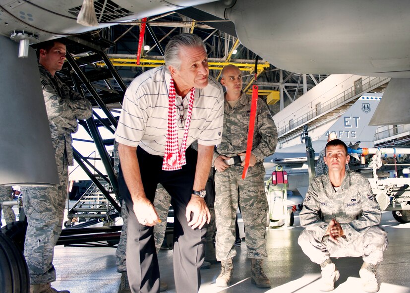 Miami Heat team president Pat Riley checks out an F-15 with members of the 46th Test Wing during the team’s tour of the wing’s facility at Eglin Air Force Base, Fla., Sept. 30.  The team was in the area for a training camp at Hurlburt Field.   Other members of the team visited Eglin’s ground combat training squadron and the youth center.  (U.S. Air Force photo/2nd Lt. Andrew Caulk)