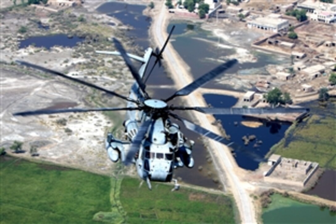 A U.S. Marine Corps Super Stallion helicopter flies to deliver relief supplies during humanitarian-assistance operations in the southern province of Sindh, Pakistan, Sept. 30, 2010. The helicopter is assigned to the 26th Marine Expeditionary Unit.