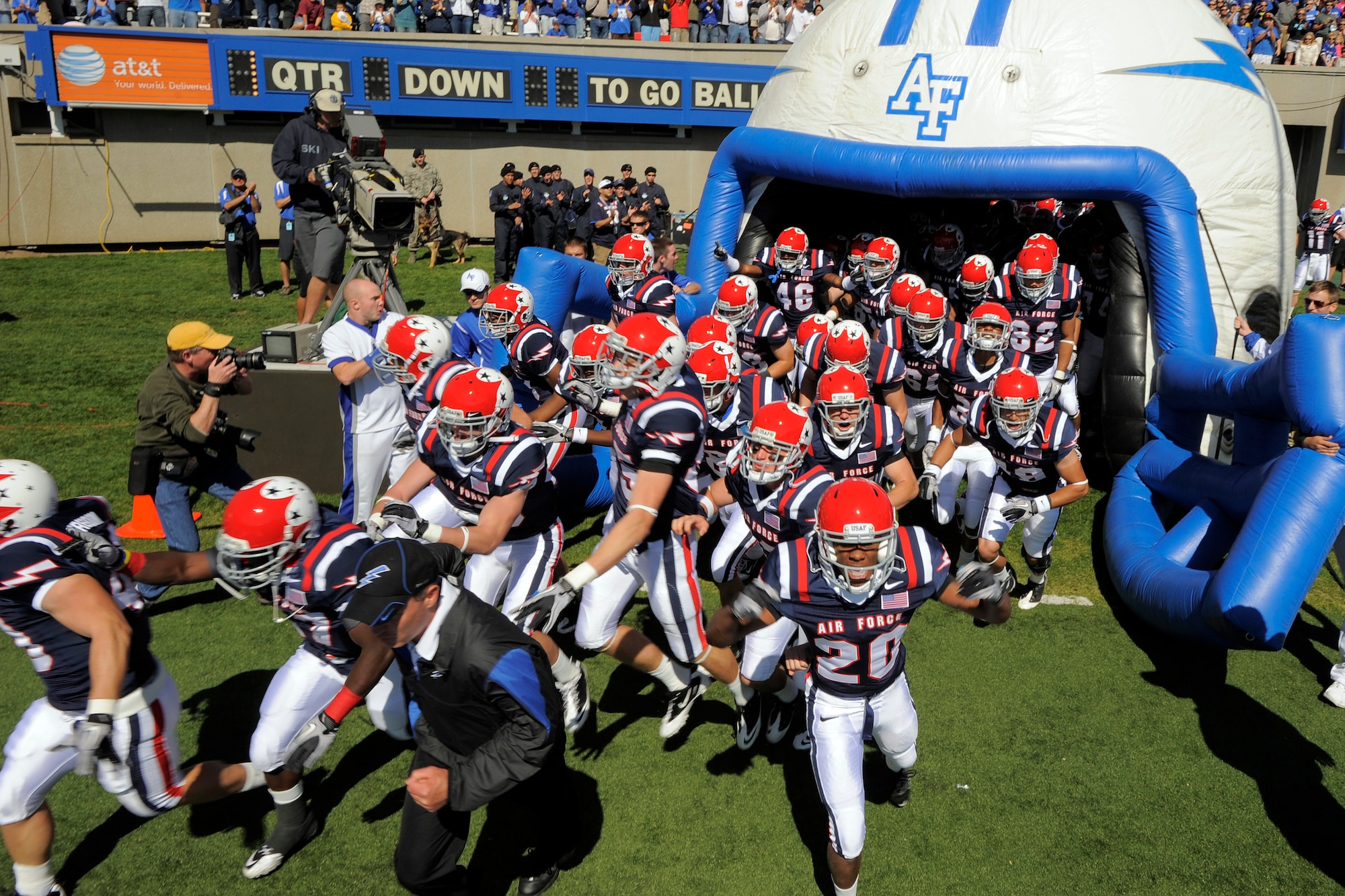 The U.S. Air Force Academy Falcons football team takes the field prior to the start of the Air Force vs. Navy game at the U.S. Air Force Academy's Falcon Stadium in Colorado Springs, Colo Oct 2, 2010.  The Falcons wore special uniforms as a tribute to the Thunderbirds. This was the Falcons' first victory over Navy since 2002. (U.S. Air Force photo/Mike Kaplan)  