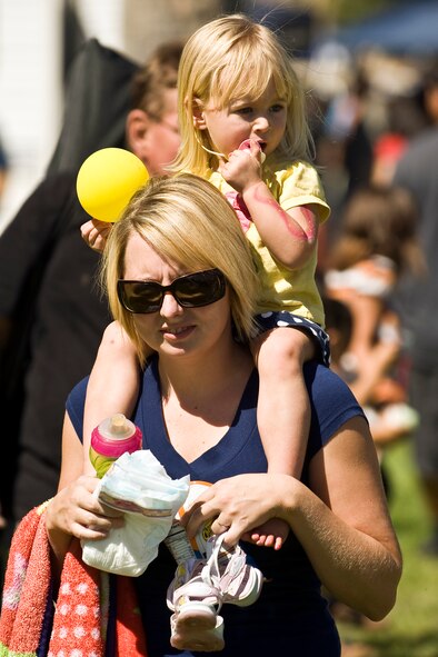 Jennifer Platt, wife of Staff Sgt. Kyle Platt, 452nd CE, and daughter participates in the activities during the 38th Annual Military Appreciation Picnic at March Air Reserve Base, Calif. Sept. 18. (U.S. Air Force photo by Tech. Sgt. Efren Lopez)
